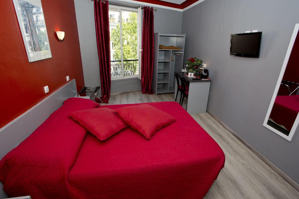 Кровать или кровати в номере Hipotel Paris Voltaire Bastille