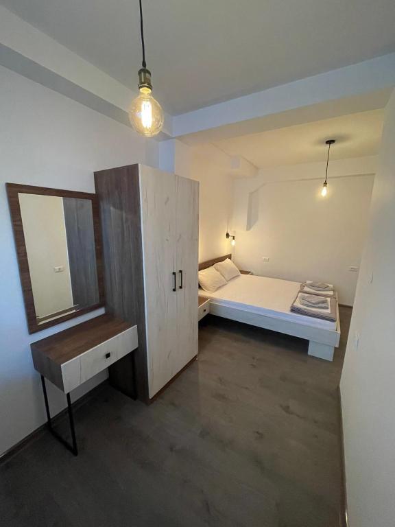 Postel nebo postele na pokoji v ubytování AGH Elite Apartments & Studios