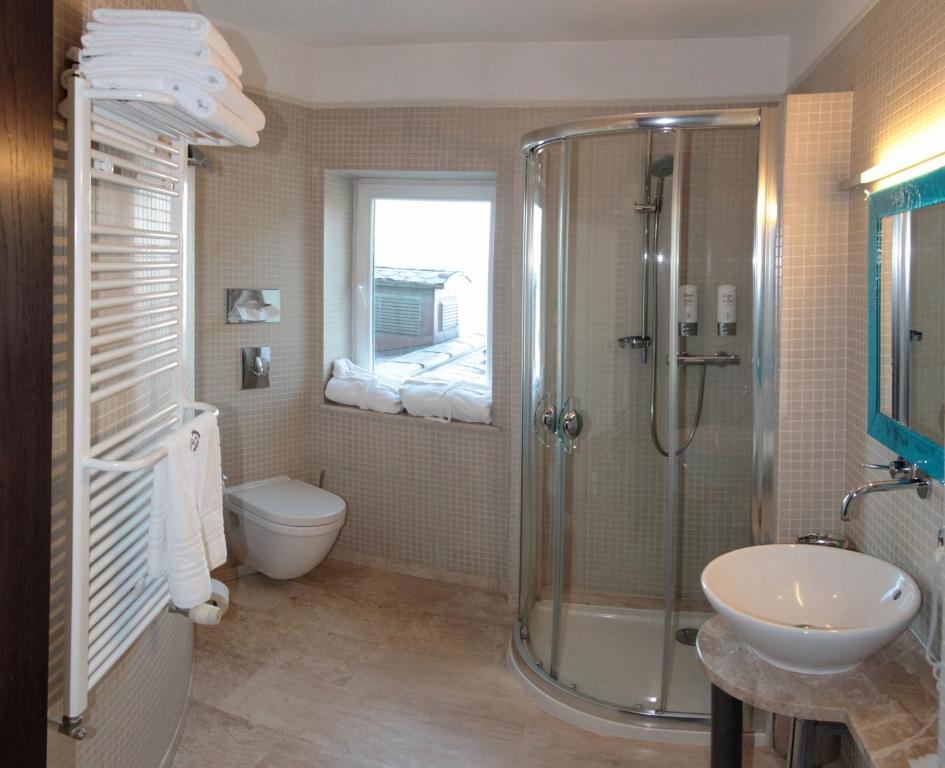 Koupelna v ubytování Hotel Apollo