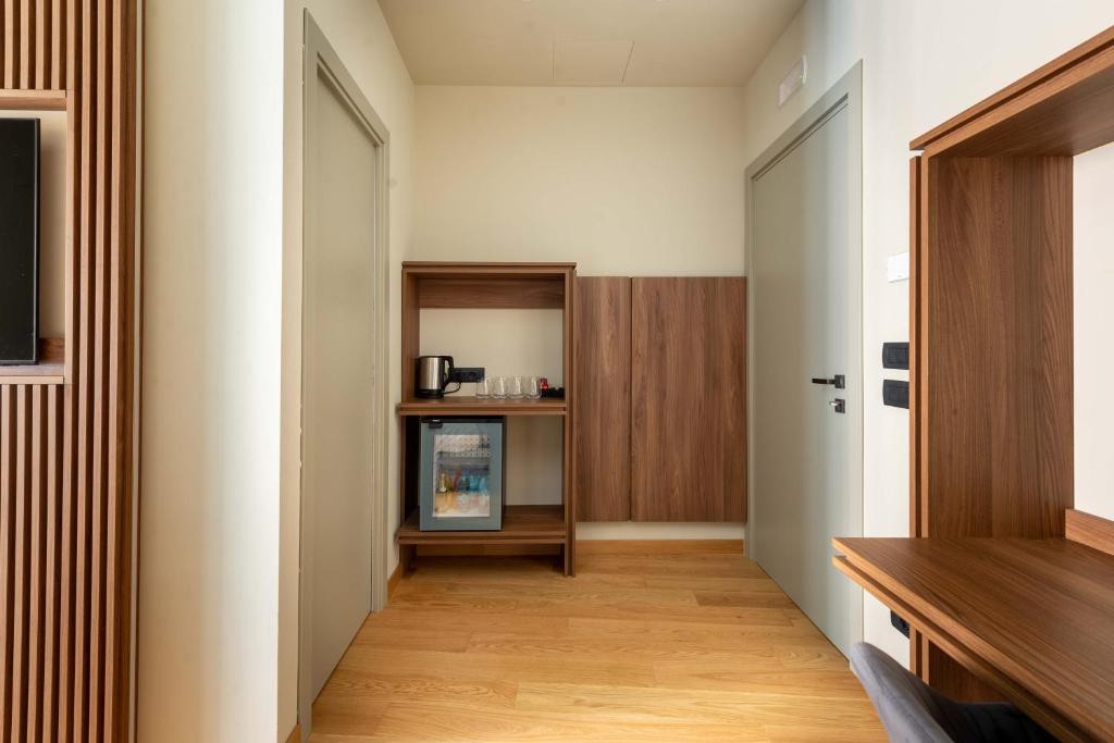 a hallway with a door leading into a room at ELICAL Exclusive Private Suites in Rome