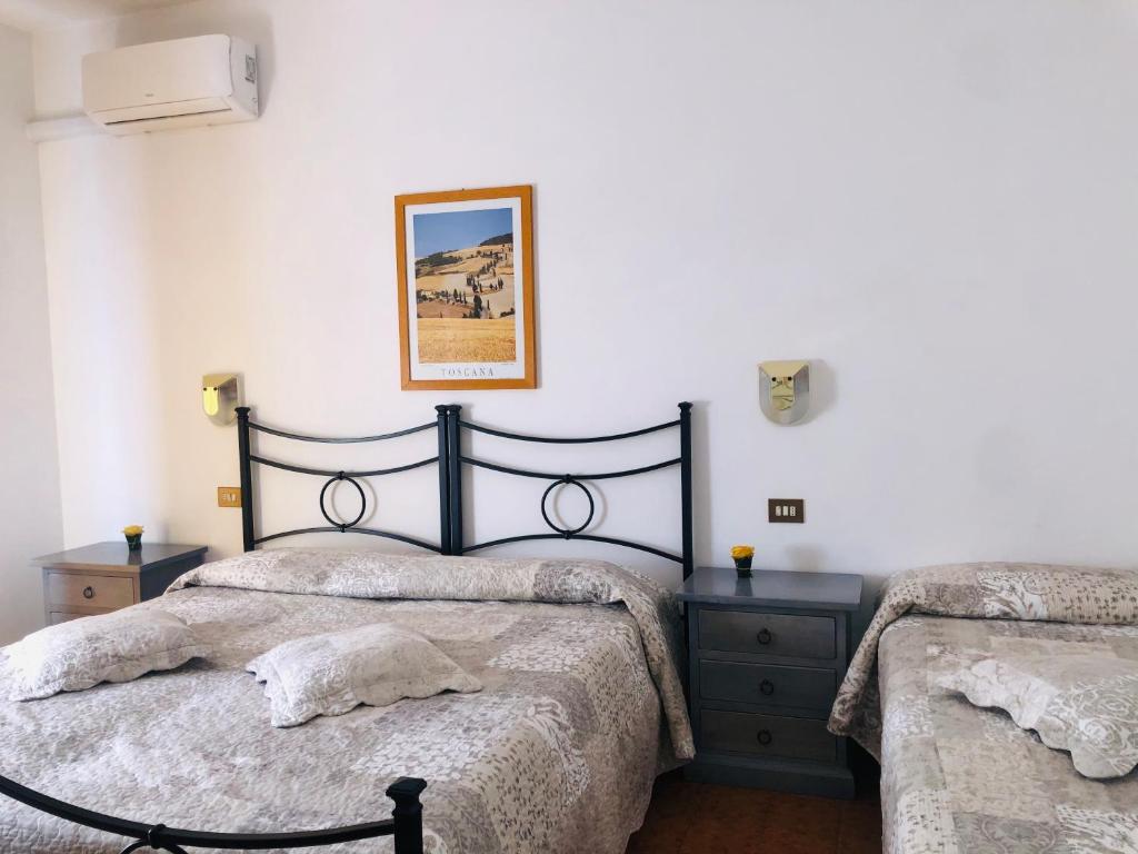 Postel nebo postele na pokoji v ubytování Hotel Marvin
