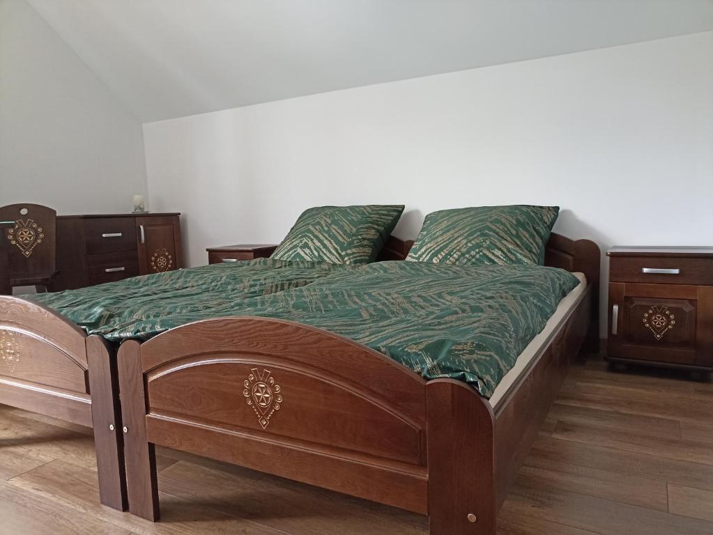 Posteľ alebo postele v izbe v ubytovaní Dom Dobre Miejsce