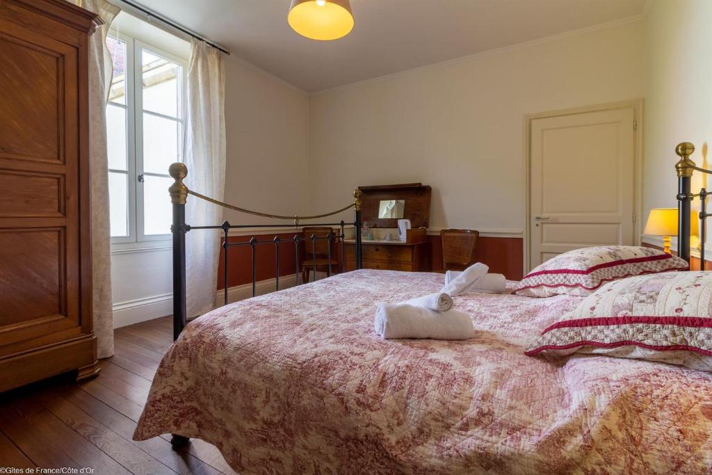Postel nebo postele na pokoji v ubytování L'orée du lac - Formule Chambres