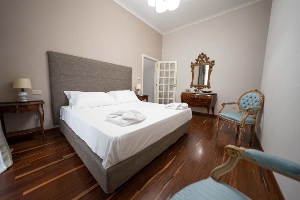 Ένα ή περισσότερα κρεβάτια σε δωμάτιο στο I due Balconcini By Dimorra