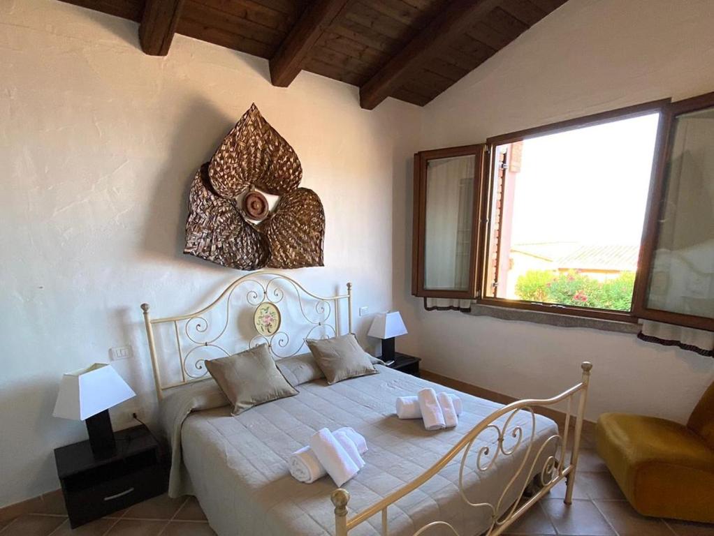 Ένα ή περισσότερα κρεβάτια σε δωμάτιο στο Casa Girasole