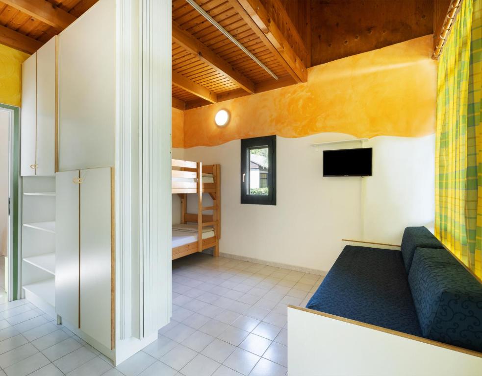Postel nebo postele na pokoji v ubytování Residence Mare Pineta