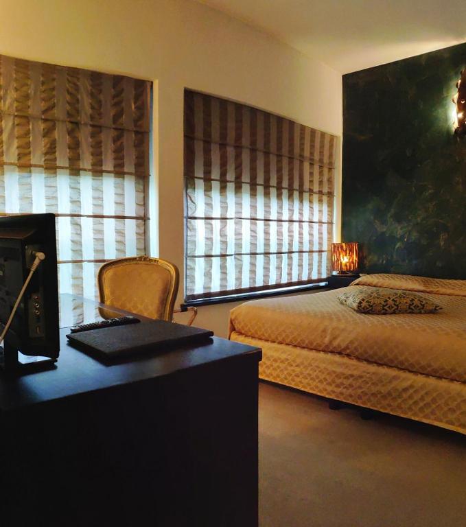 Postel nebo postele na pokoji v ubytování Hotel Feel Inn Venice Airport