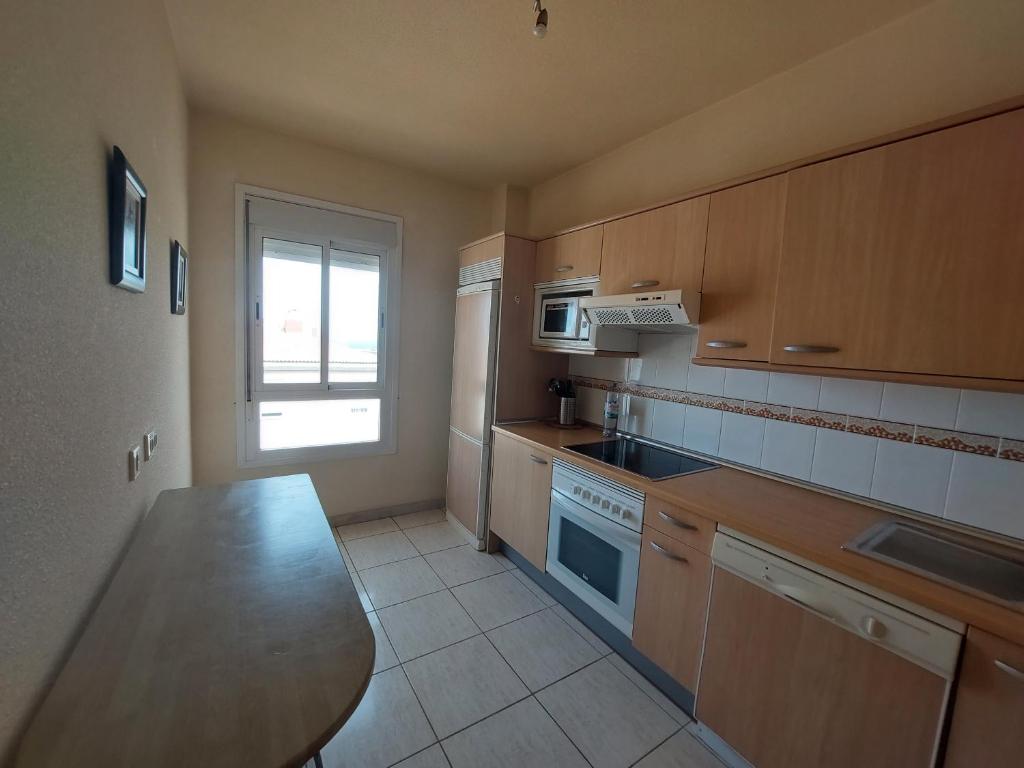 Kuchyň nebo kuchyňský kout v ubytování Cosy & Central Apartament Vecindario