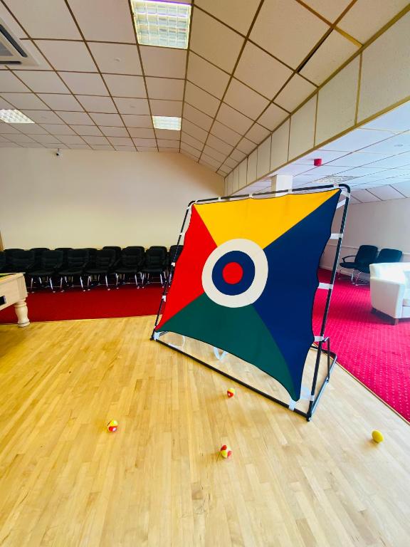 a kite on the floor of an empty room at Croyde Bay Hotel or Self Catering in Croyde