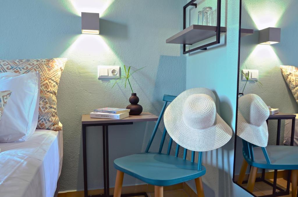 Voodi või voodid majutusasutuse Joya Ofrynio Stylish Suites toas