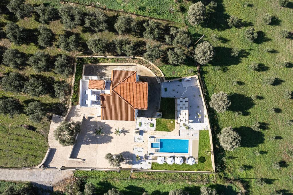 an aerial view of a house with a pool at Vita Residence, a Charming Family Escape,By ThinkVilla in Pangalochori