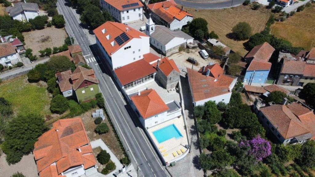 an aerial view of a house with a swimming pool at JP HOUSE in Nelas