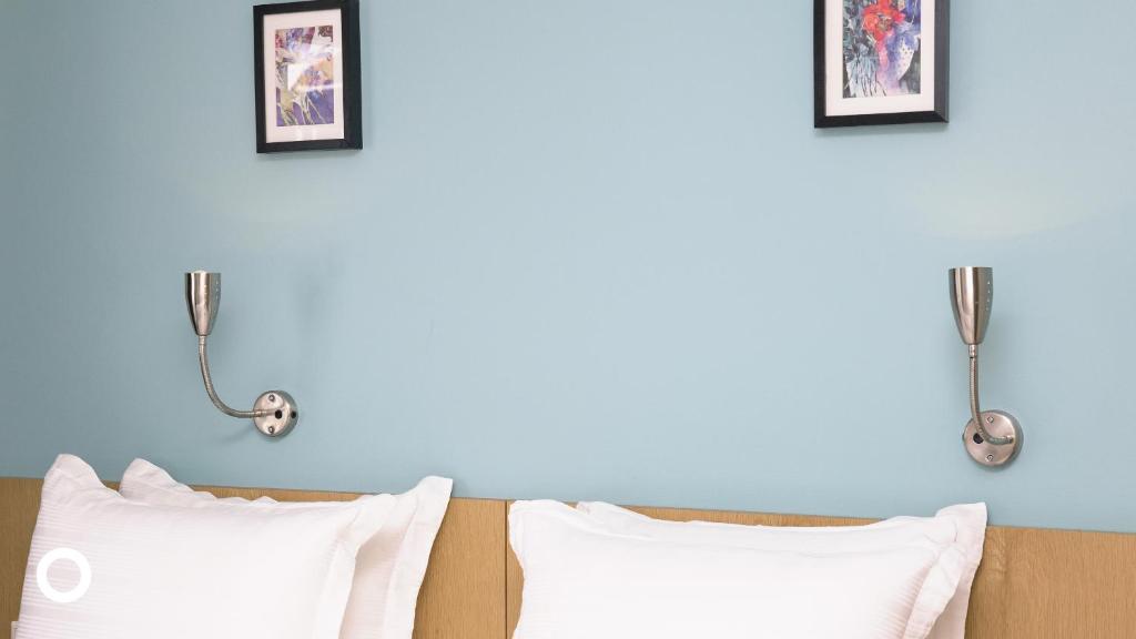 Postel nebo postele na pokoji v ubytování Center Hotels Klopp