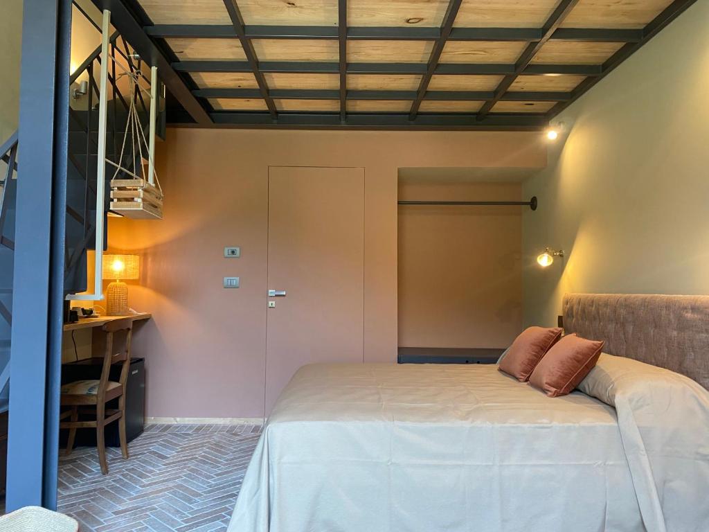 Postel nebo postele na pokoji v ubytování Agriturismo Peq Agri-Resort Tovo