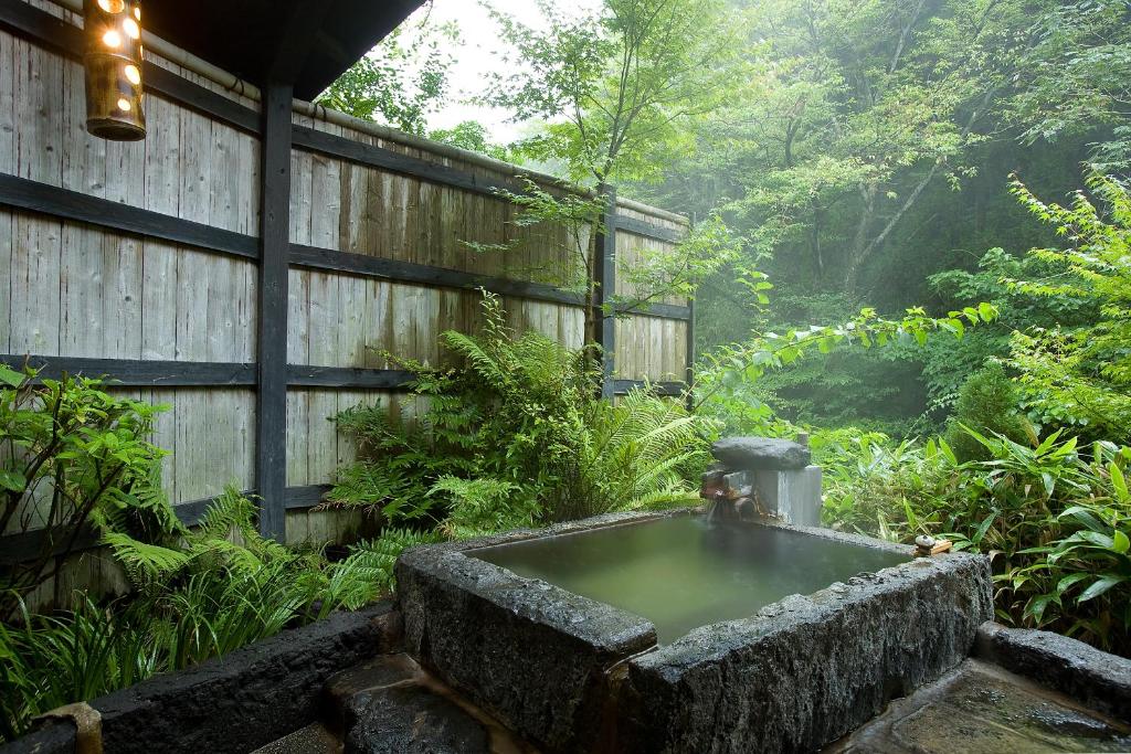 Zahrada ubytování Kurokawa Onsen Oku no Yu