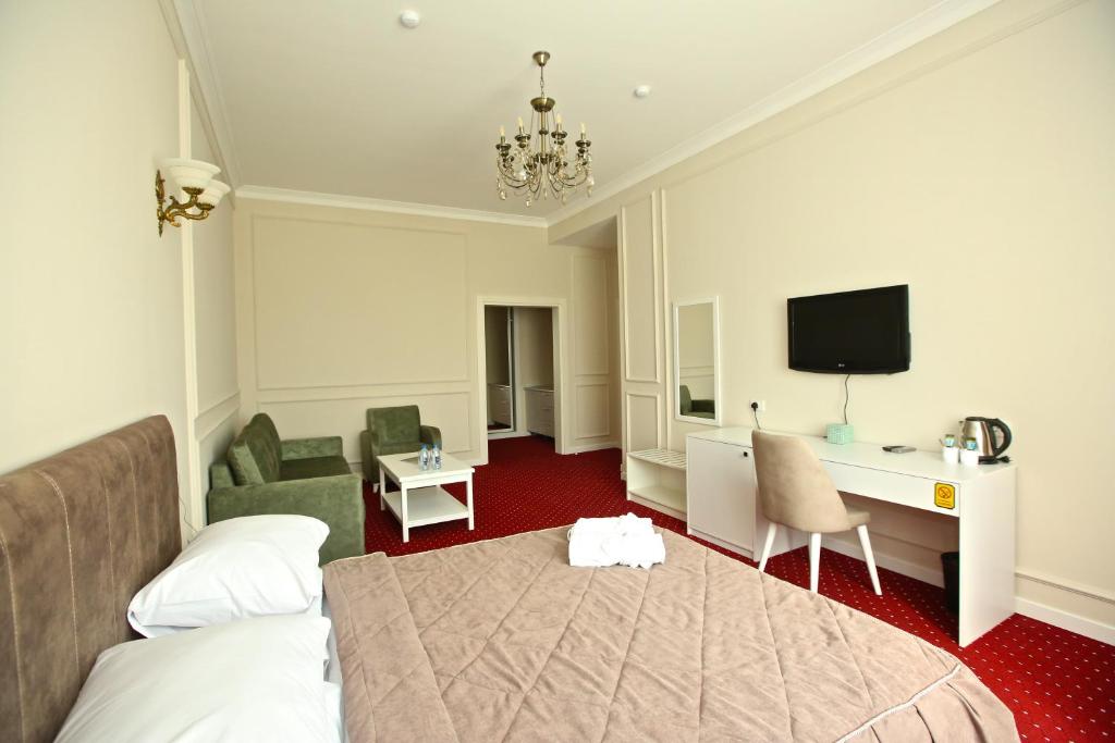 TV a/nebo společenská místnost v ubytování Miraj hotel