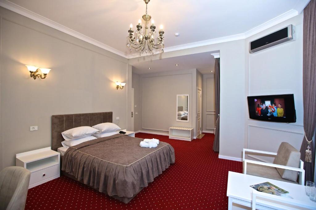 Postel nebo postele na pokoji v ubytování Miraj hotel