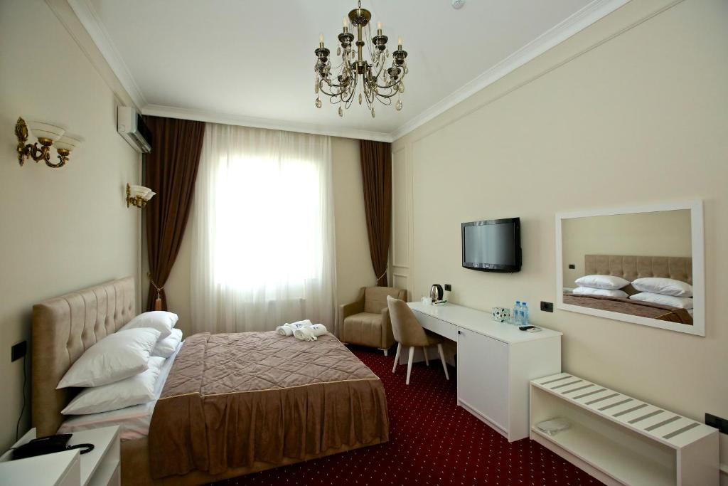 TV a/nebo společenská místnost v ubytování Miraj hotel