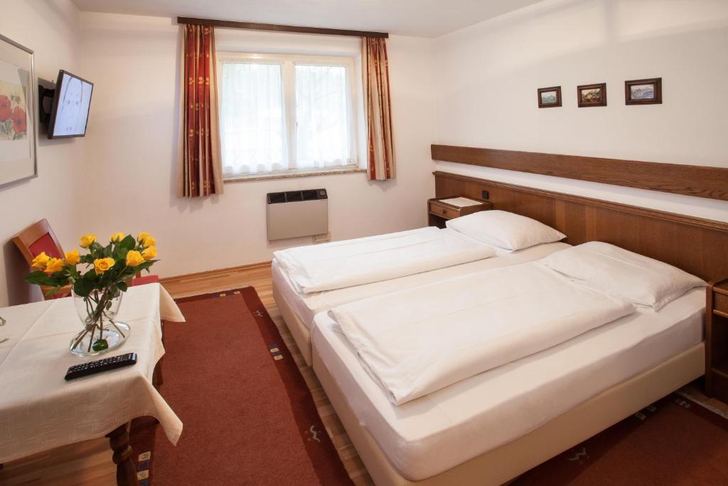 Postel nebo postele na pokoji v ubytování Gästehaus Sunkler