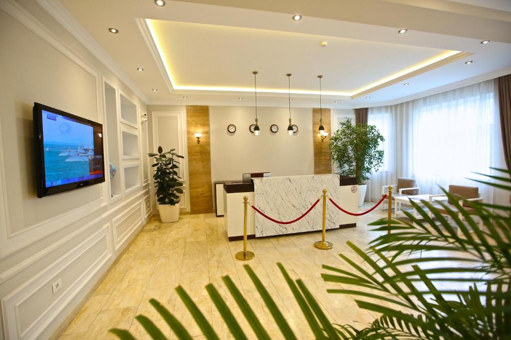 TV a/nebo společenská místnost v ubytování Miraj hotel