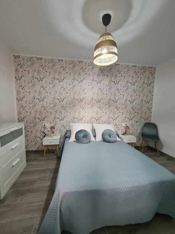 Posteľ alebo postele v izbe v ubytovaní COLON Nerja
