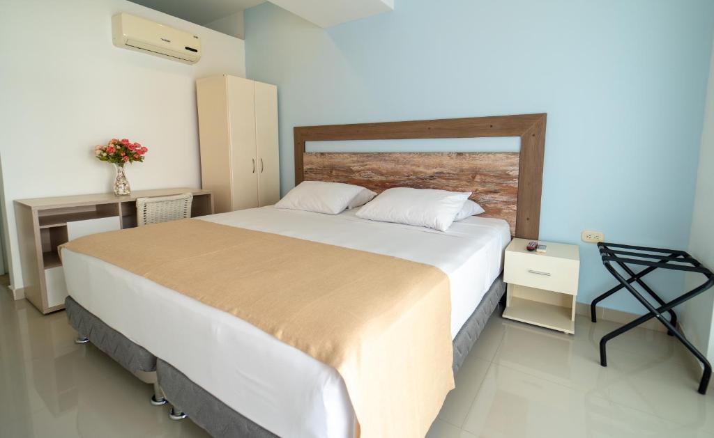 Voodi või voodid majutusasutuse Santorini Casablanca Resort toas
