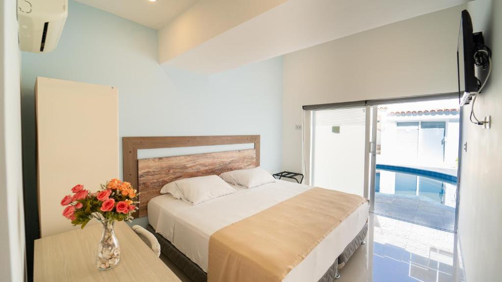 Voodi või voodid majutusasutuse Santorini Casablanca Resort toas