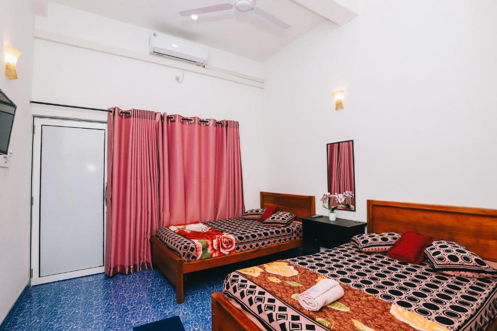 Postel nebo postele na pokoji v ubytování DELIGHT REICH HOTEL