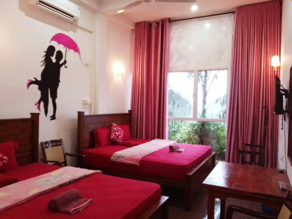 Postel nebo postele na pokoji v ubytování DELIGHT REICH HOTEL
