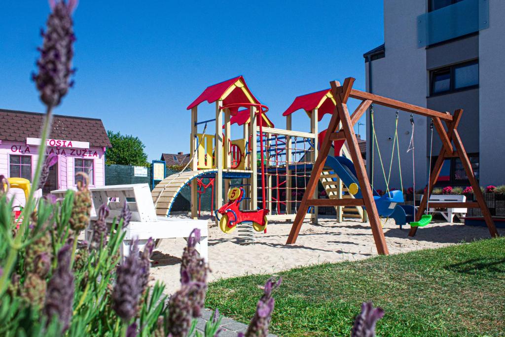 Herní místnost nebo prostor pro děti v ubytování Domki i Apartamenty Al Mare