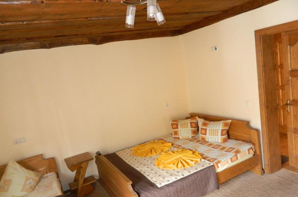 Postel nebo postele na pokoji v ubytování U Stozi Hotel