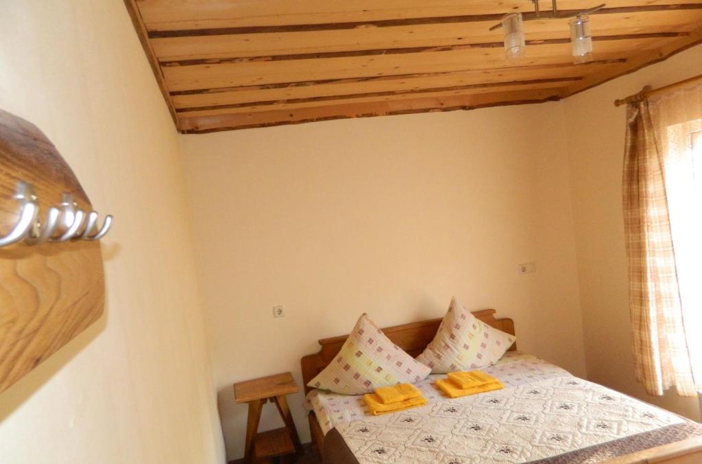 Postel nebo postele na pokoji v ubytování U Stozi Hotel