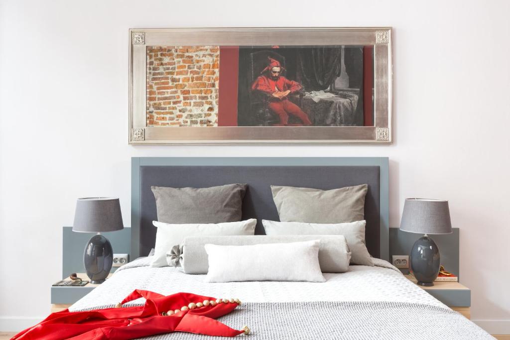 Posteľ alebo postele v izbe v ubytovaní Cadena Gallery Apartments Matejko