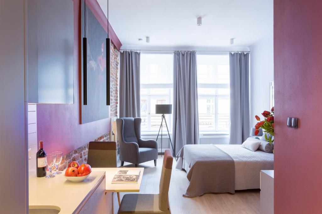 Posteľ alebo postele v izbe v ubytovaní Cadena Gallery Apartments Matejko