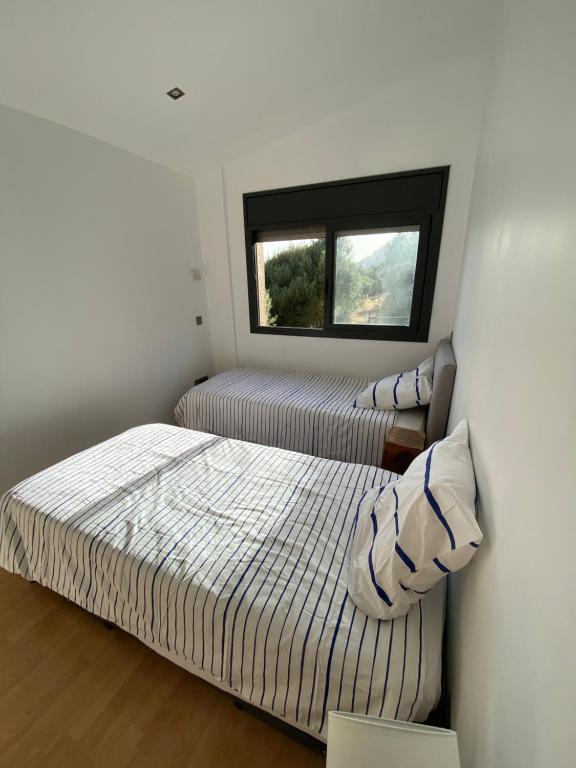 Posteľ alebo postele v izbe v ubytovaní Villa familiale piscine privée et magnifique vue mer