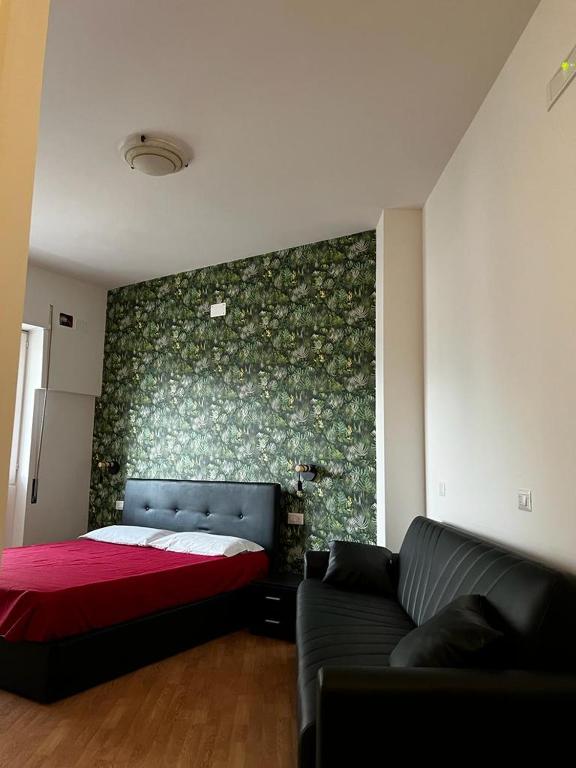 A bed or beds in a room at Casa di Charlie
