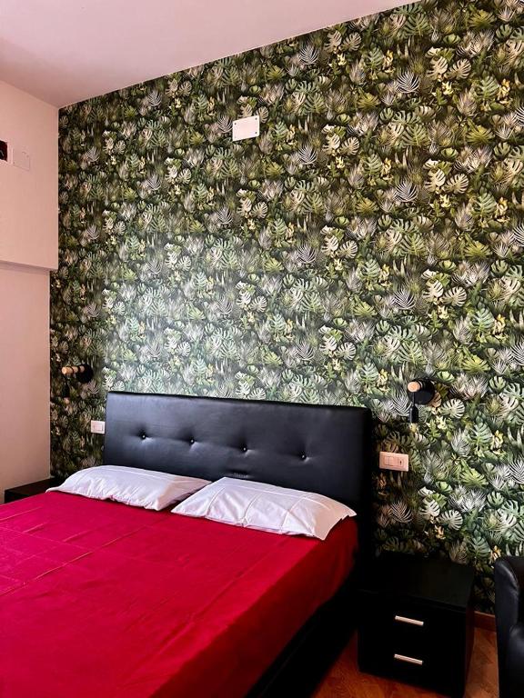 A bed or beds in a room at Casa di Charlie