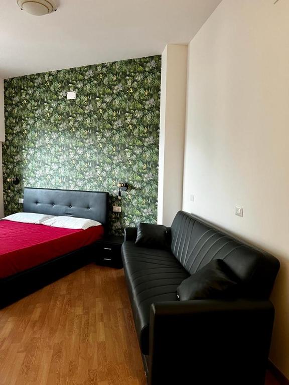 A bed or beds in a room at Casa di Charlie