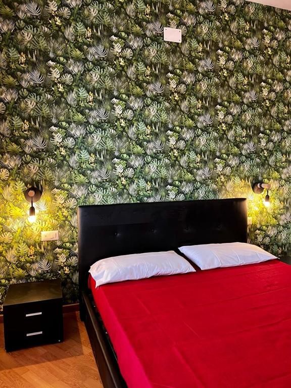 A bed or beds in a room at Casa di Charlie