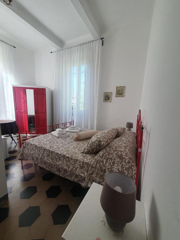 A bed or beds in a room at Relais Puccini