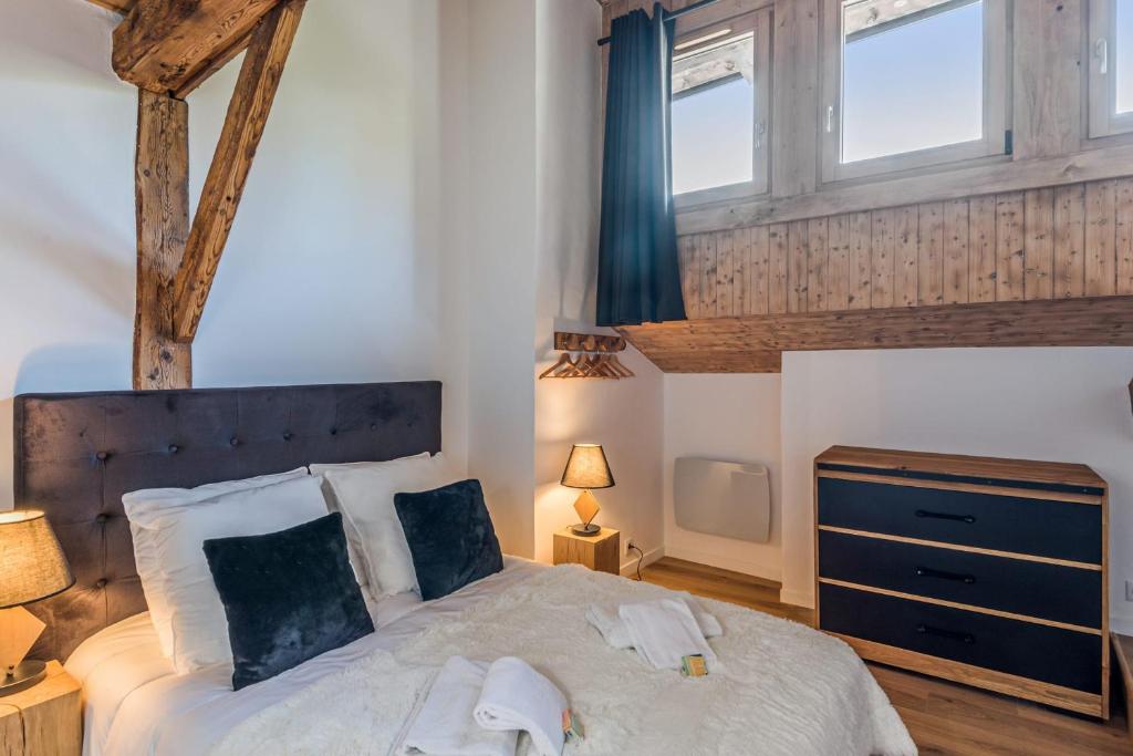 Posteľ alebo postele v izbe v ubytovaní Appartement Le Mont-Blanc - Welkeys