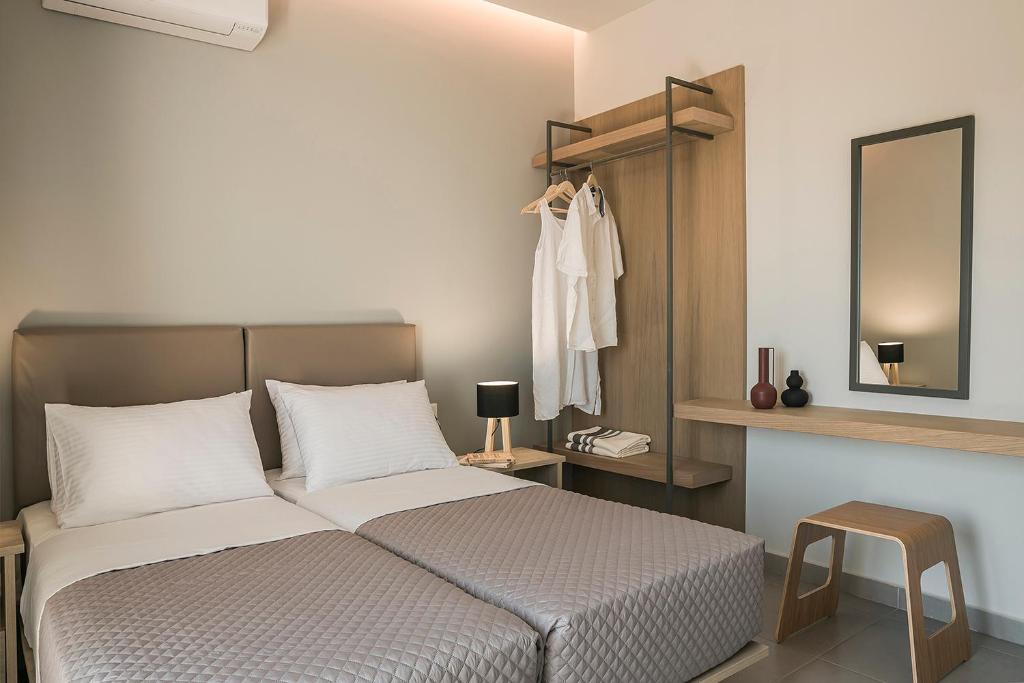 Postel nebo postele na pokoji v ubytování Petradi Villas Skala
