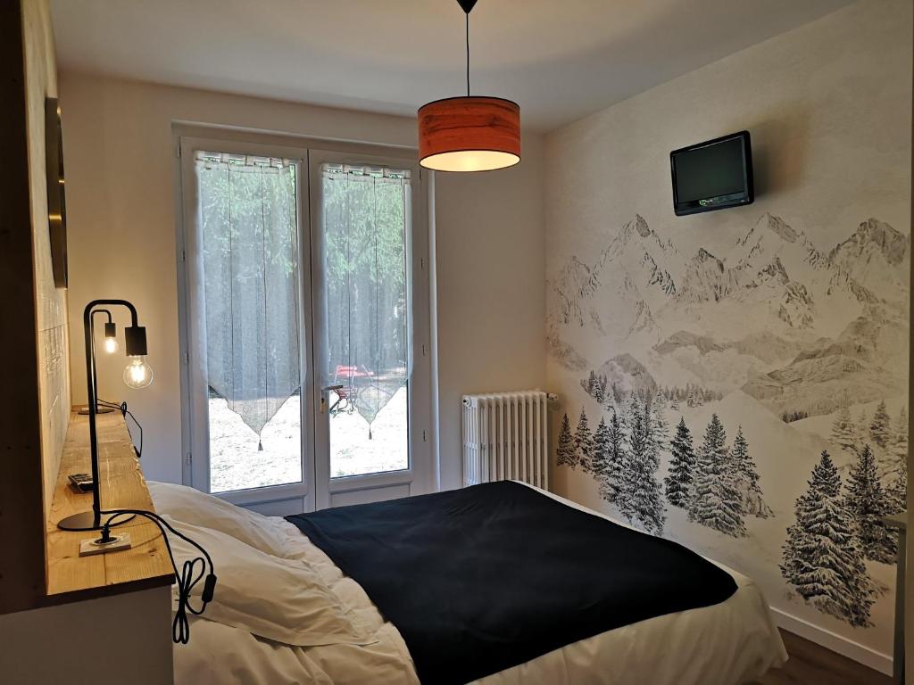 Postel nebo postele na pokoji v ubytování Le Relais d'Avajan