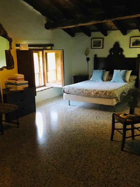A bed or beds in a room at Mas Molladar solo adultos