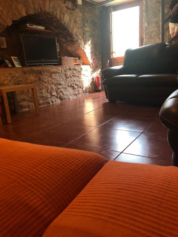 A seating area at Mas Molladar solo adultos