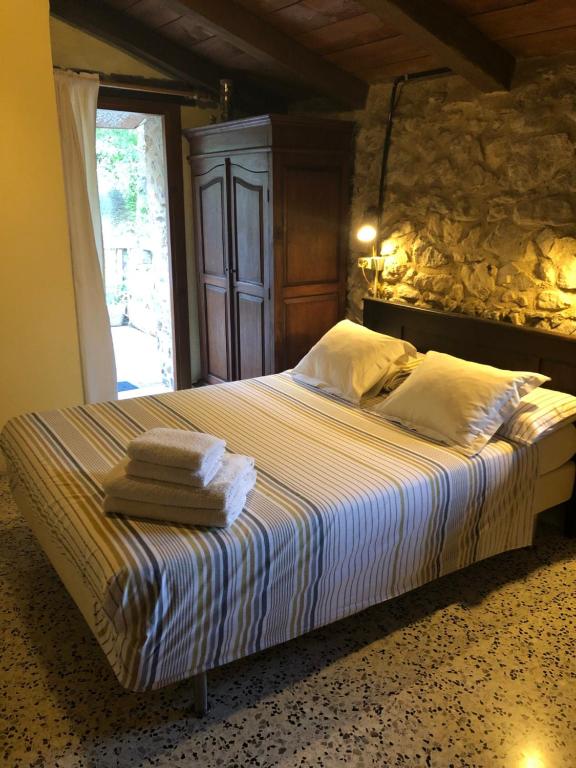A bed or beds in a room at Mas Molladar solo adultos