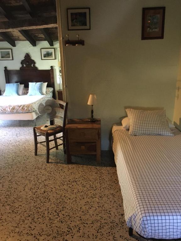 A bed or beds in a room at Mas Molladar solo adultos