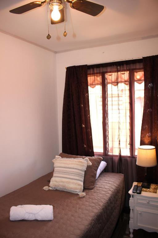 Postel nebo postele na pokoji v ubytování F&M Guesthouse