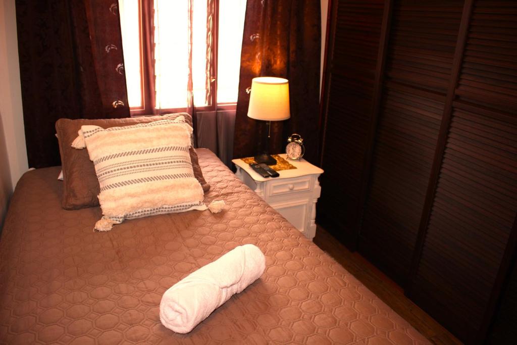 Postel nebo postele na pokoji v ubytování F&M Guesthouse