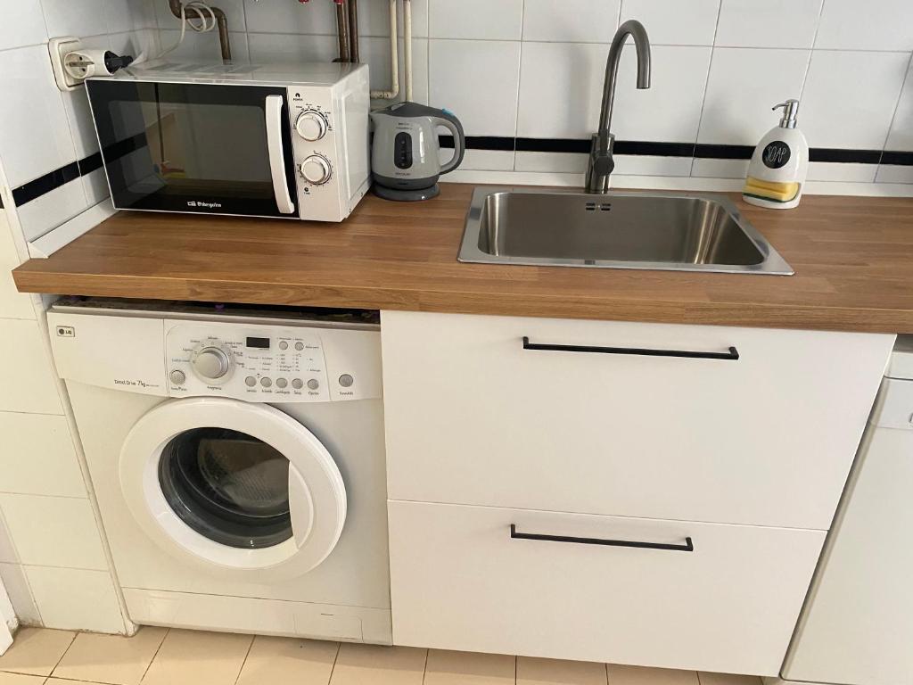 Kuchyň nebo kuchyňský kout v ubytování Topitos Apartment Casc Antic